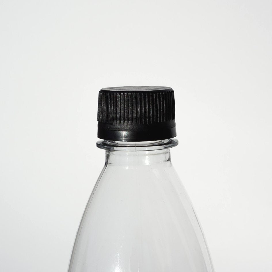 Tjudrad kapsyl med kvarsittande kork 28 mm på plastflaska