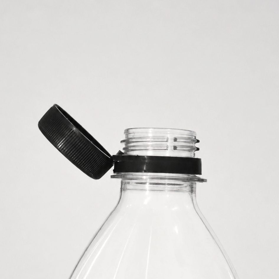 Tjudrad kapsyl PCO med kvarsittande kork 28 mm på plastflaska