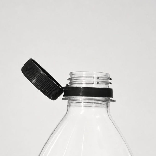 Tjudrad kapsyl PCO med kvarsittande kork 28 mm på plastflaska